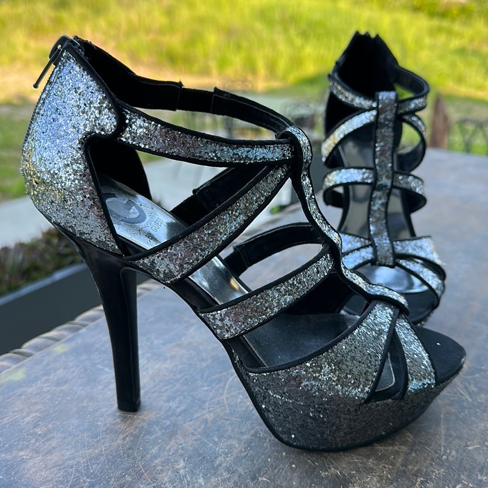 New silver and black guess shoes